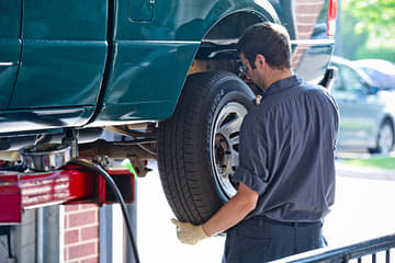 Person considering tyre care