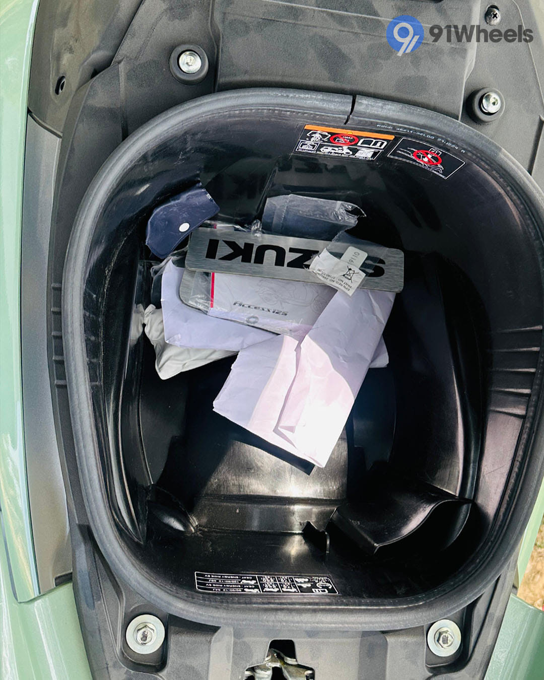 Suzuki E Access Underseat Storage