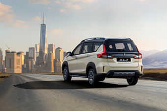 Maruti Suzuki XL7 Left Rear Three Quarter Maruti Suzuki XL7 Left Rear Three Quarter