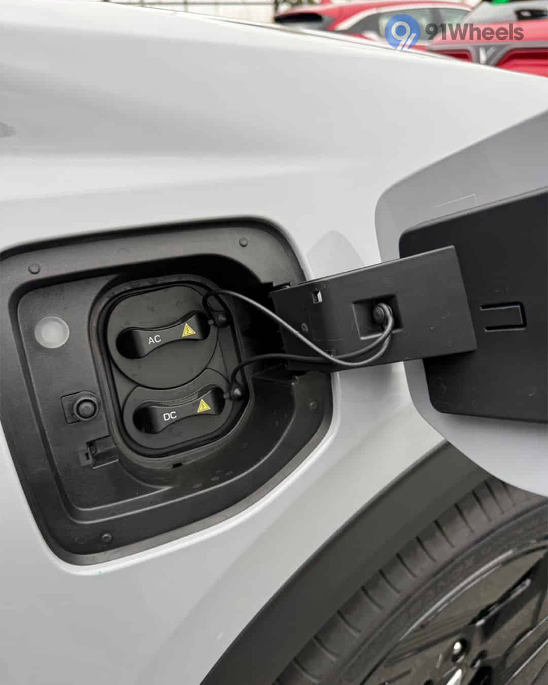 Open Charging Lid with Closed Socket Caps