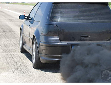 Reasons Behind Black Smoke from Car