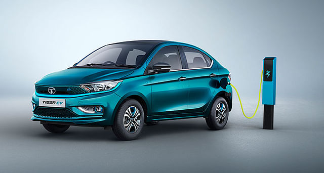 2021 tata tigor ev signautre teal blue front three quarters