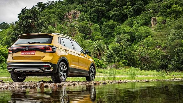 vw taigun review gt dsg yellow rear three quarters