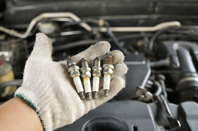 spark plugs on engine block
