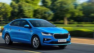 skoda slavia crystal blue studio shot front three quarters