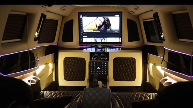 Modified KIA Carnival 32-inch TV screen for entertainment