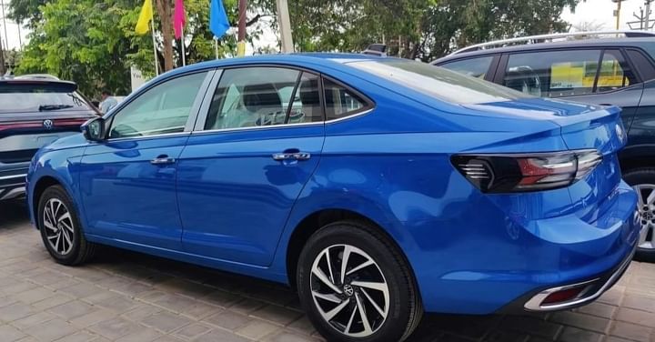 Vw Virtus Starts Arriving At Dealerships; Rising Blue Shade Spotted For 