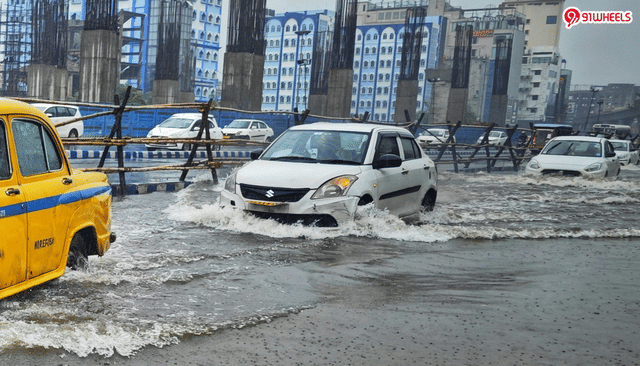 Car Stuck in a Flooded Road